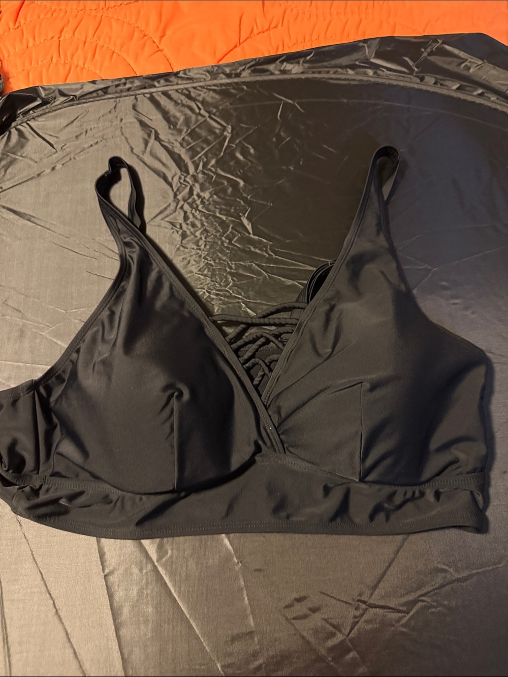 Black adjustable straps swim top from torrid 2X never worn no tags brand new.